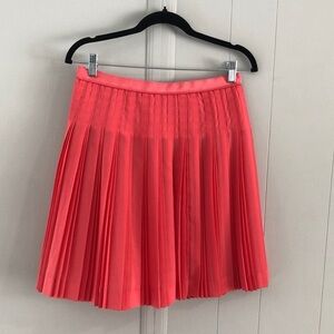 J Crew bright coral pleated skirt